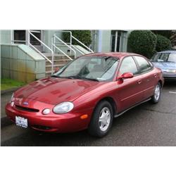 1999 Taurus, red