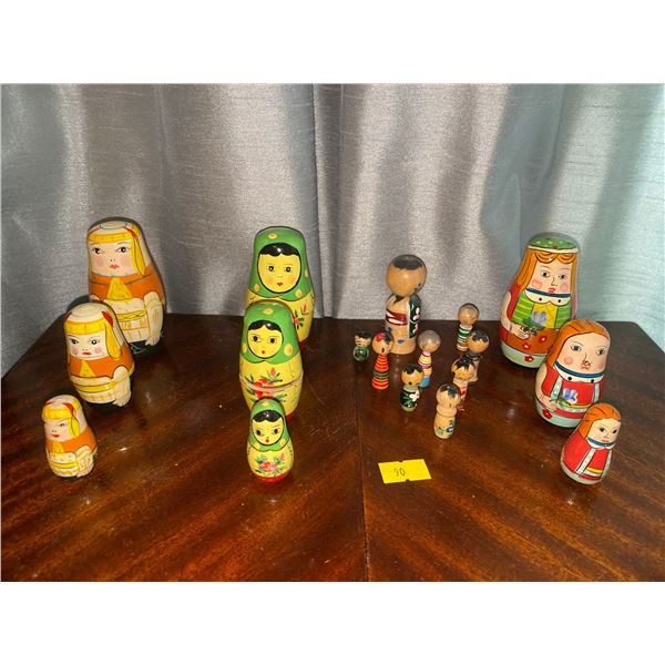Assortment Of Russian Nesting Dolls And Wooden Figurines