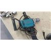 Image 2 : 2 Makita Power Tools: 1/2'' Drill , Angle Grinder