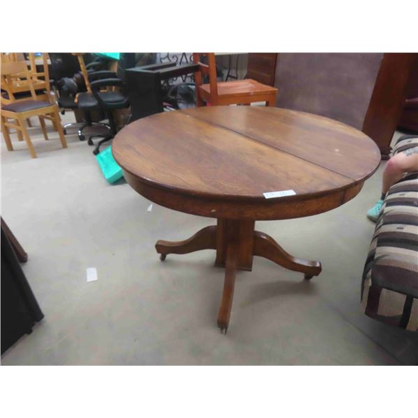 1/4 Cut Oak Pedestal Table 30'' x 42''