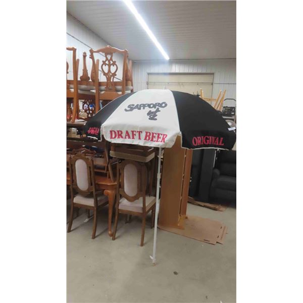 Patio Umbrella with Sapporo Beer Advertisement