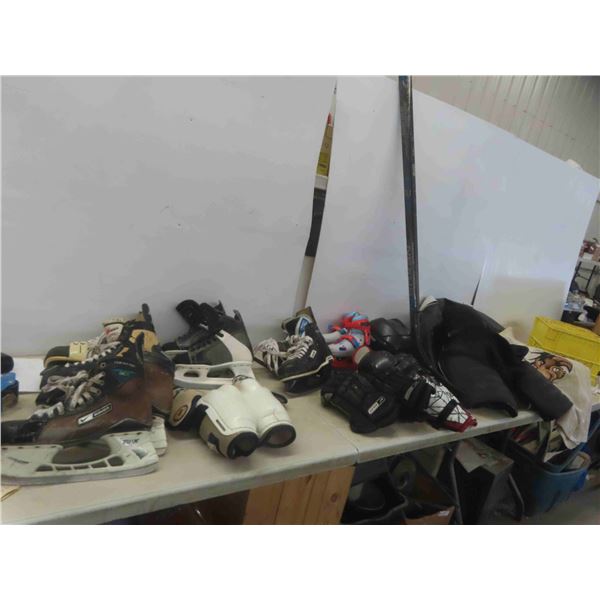 Hockey Equipment : 2 Sticks, Helmet, Shin Pads, Gloves, Elbow Pads, 5 Pairs