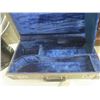 Image 2 : Trumpet Case & Oscilating Fan