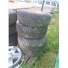 Image 1 : 4 Goodyear Wrangler Tires and Rims P235/75R 15
