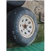 Image 2 : 4 Goodyear Wrangler Tires and Rims P235/75R 15