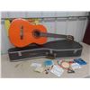 Image 1 : Yamaha Guitar with Hard Case, Extra Strings & Picks - 1 