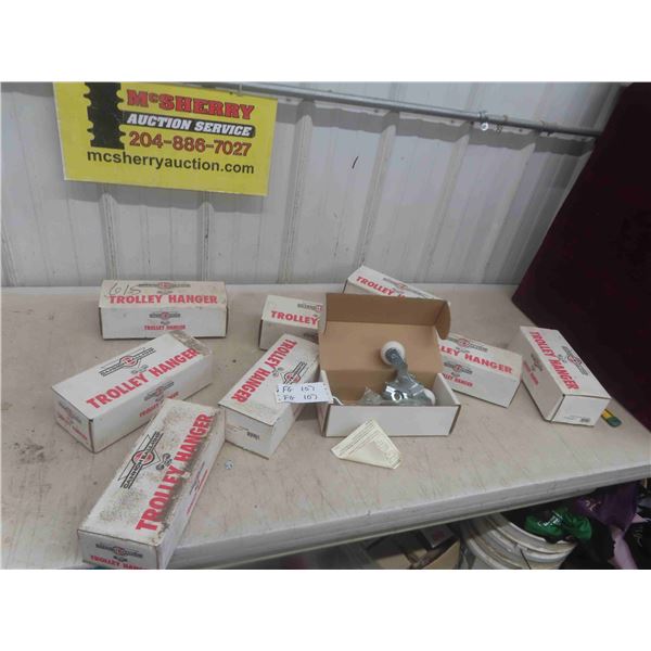 9 Boxes of Trolley Hangers