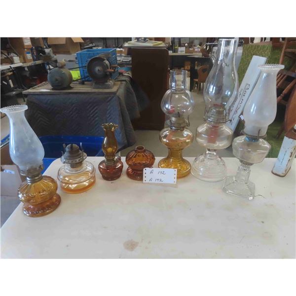 8 Oil Lamps Amber & Clear Glass - 2 Missing Chimneys, 1 Missing Wick