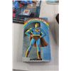 Image 3 : Superman Figurine, VHS Tape, and Other Merch