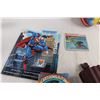 Image 4 : Superman Figurine, VHS Tape, and Other Merch