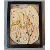 Image 5 : Child's beaded moccasins in display case