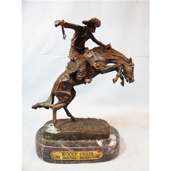 Remington, Frederic, bronze, Wooly Chaps, 9 1/2  t x 7 1/2  w x 4  d, marble base