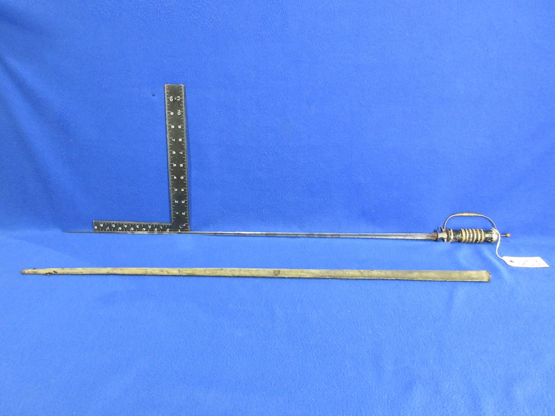 Triangular Sword with what Appears to be Asian Markings