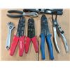 Image 2 : wire strippers, wrenches, ring spreader, etc.