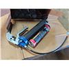 Image 2 : grease gun and 10 grease tubes