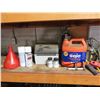 Image 2 : pipe wrench, work light, tools ,etc.
