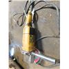 Image 1 : Dewalt heavy duty angle grinder - working
