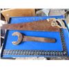 Image 1 : carpenter square , large antique wrench , hand saw