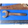 Image 2 : carpenter square , large antique wrench , hand saw