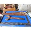 Image 3 : carpenter square , large antique wrench , hand saw