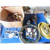 Image 1 : clothes line , tow hookos , hand sharpening stone