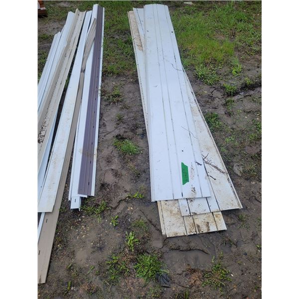 various siding skirting pieces some damaged & 17 black 2" insulation track