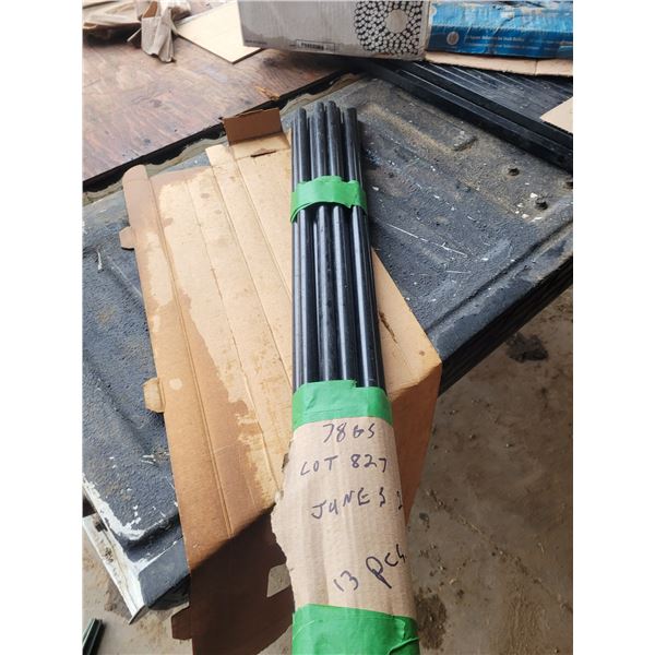 13 black round spindles