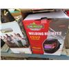 Image 2 : new welding helmet and box of extension cords / power bars
