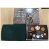 Image 1 : 2003 Proof Set. The Silver Dollar commemorates the 100th Anniversary of a miner throwing a hammer at