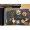 Image 2 : 2005 Proof Set. The Silver Dollar commemorates the 50th Anniversary of the Canadian flag. The Silver
