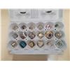 Image 1 : egg carton of jewelry