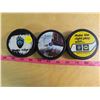 Image 1 : 3 hockey pucks- variety