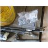 Image 2 : assorted tools, mower blade, grease gun tips, etc.