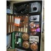 Image 2 : plastic case with a Singer buttonholer, misc. chargers, Dyson battery, backgammon, décor items, etc.