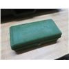Image 8 : plastic case with a Singer buttonholer, misc. chargers, Dyson battery, backgammon, décor items, etc.