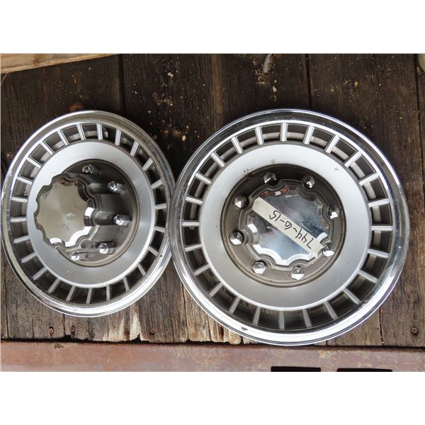 two 8 bolt hubcaps