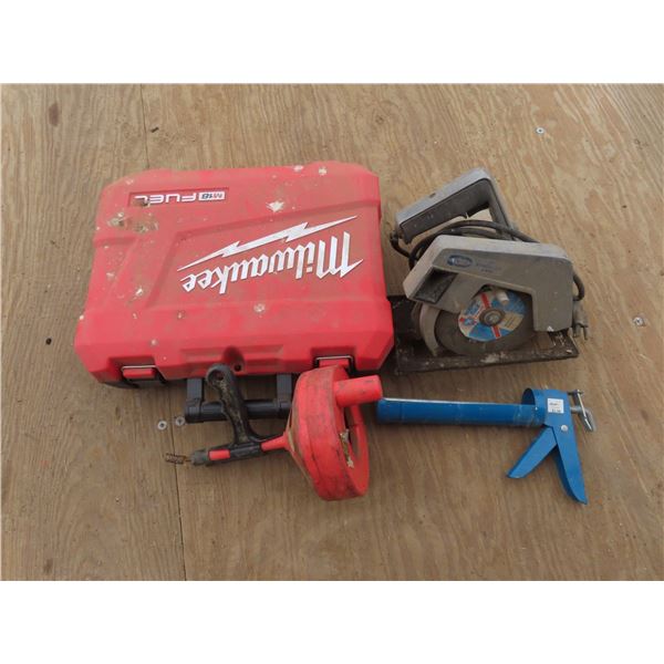 circular saw . Milwaukee case , snake