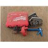 circular saw . Milwaukee case , snake