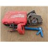 Image 3 : circular saw . Milwaukee case , snake