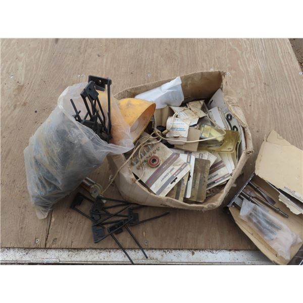 box of assorted hardware tool kits