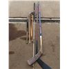 Image 1 : pool cues , deep water fishing rod , hockey sticks
