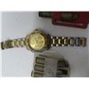 Image 2 : assorted ammo 245 Winchester and Rolex watch ( not sure if authentic )