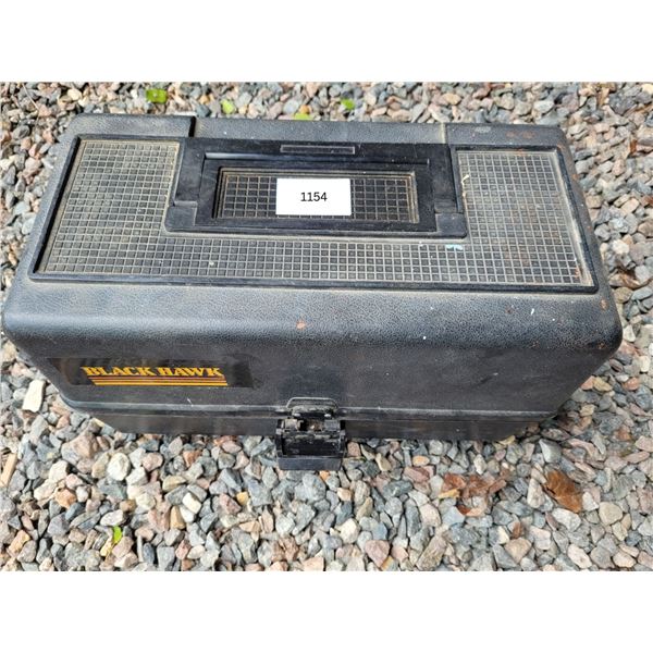 large tackle box with dozens of lures, jigs and extras