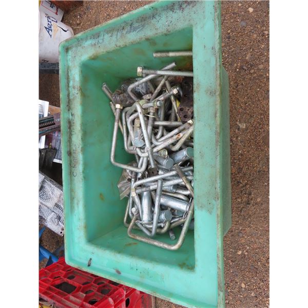 pail of U-bolts hardware