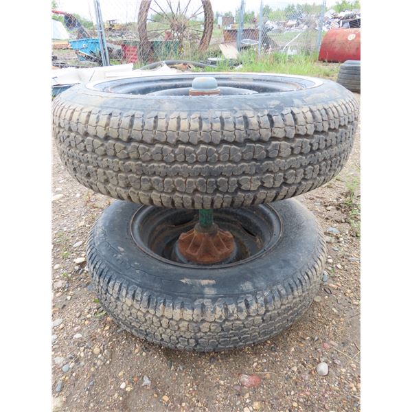 pair of steel belted 155-80-r13 wheels with bar