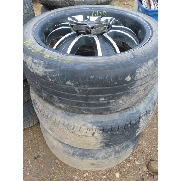 set of three 255-45-R20 tires on American racing rims