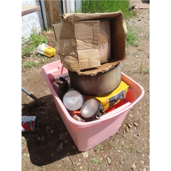 lot of oil filters tote full