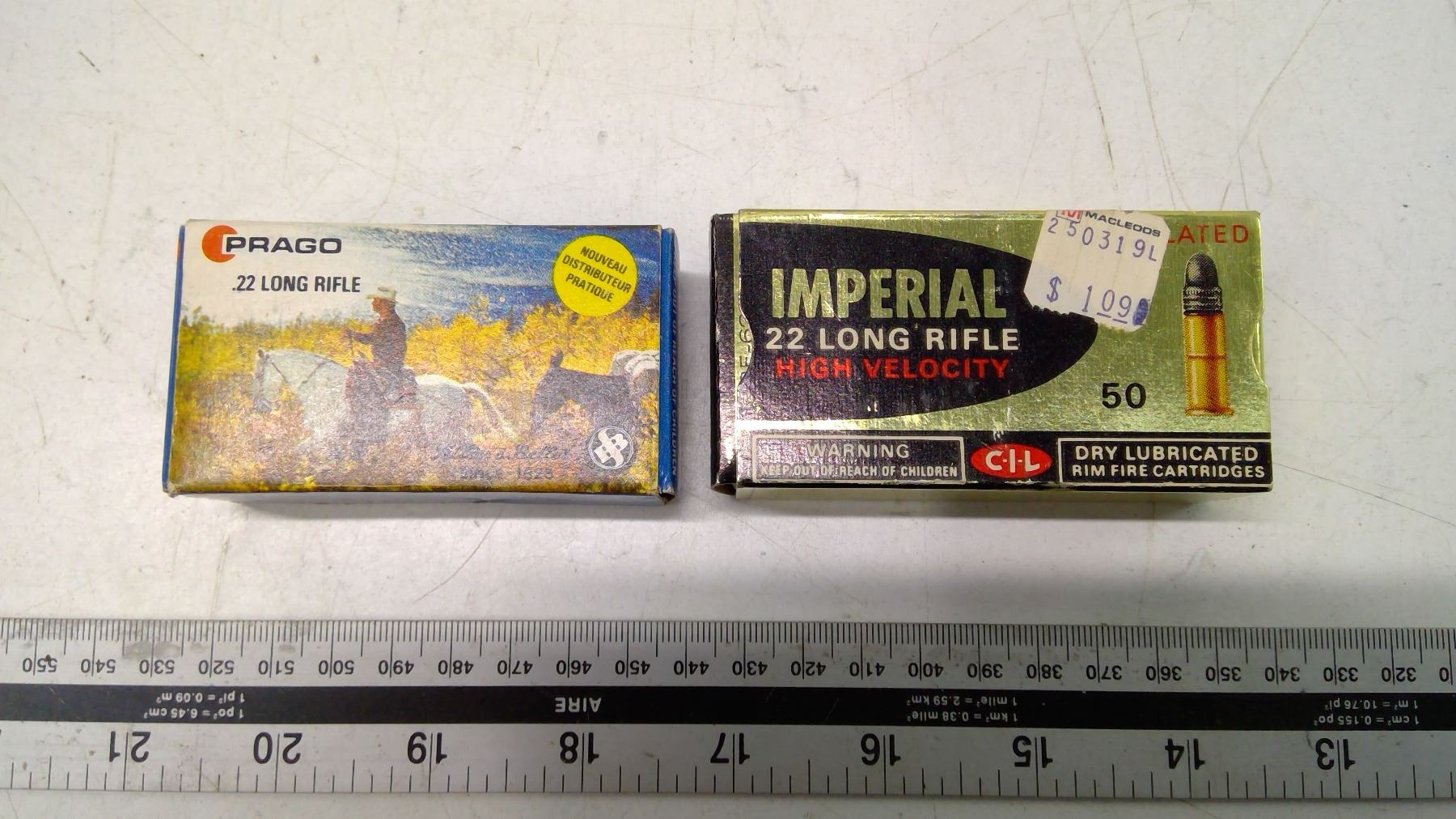 2 boxes 22 long rifle shells - Schmalz Auctions