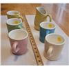 Image 1 : Five colored pottery mugs from Medalta Potteries in Medicine Hat and one matching yellow pitcher