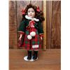 Image 1 : Porcelain doll in plaid outfit